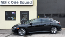Black 2018 Honda Civic Hatch with premium dark window tint